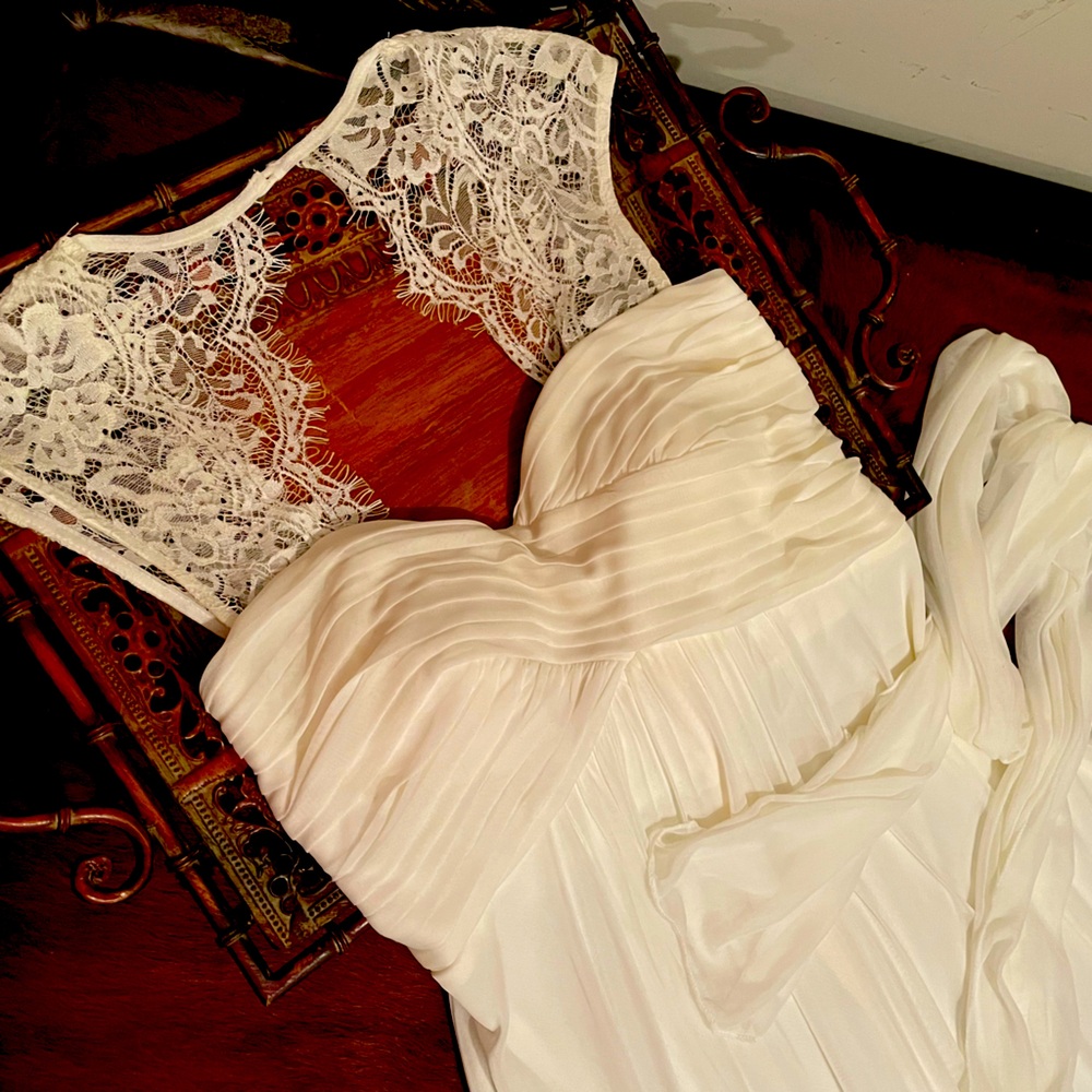 Pink blush, medium cream lace gown.